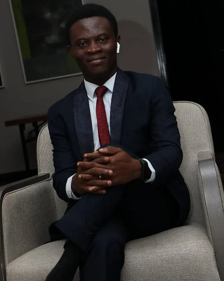 Taiwo Peace Oyeniyi in Coded TV branded attire